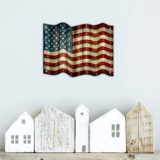 Waving American Flag - Corrugated Metal Wall Art with rustic wood signs below on a light gray wall background